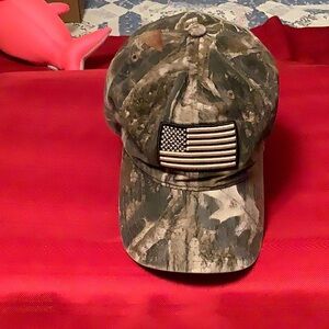 Truetimber CAMO hat with Black and White US Flag. Adjustable to fit. Great shape